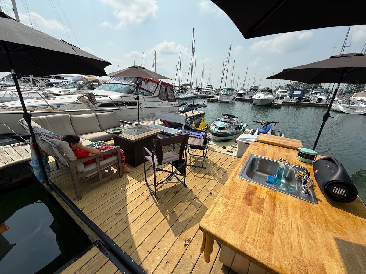 Finished dock with seating and a counter at the marina